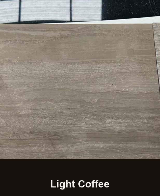 A cut sample of the light coffee board: a pale warm beige with soft straight veining running across it, photographed on a white bench.